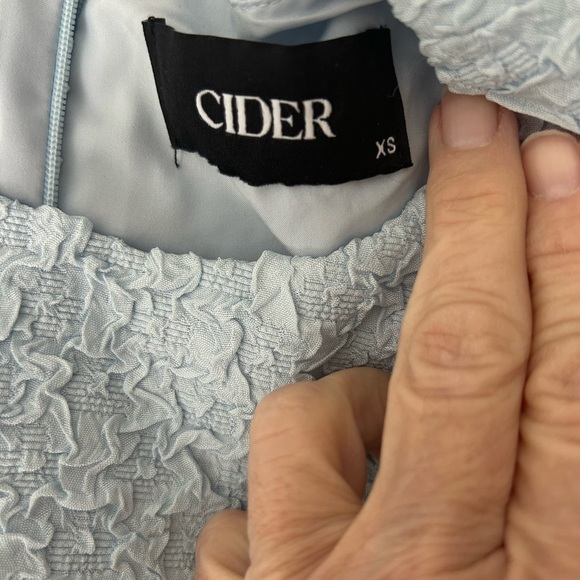 Elegant Blue sophisticated dress by Cider is a rare find .
Boutique look:) - Picture 4 of 8